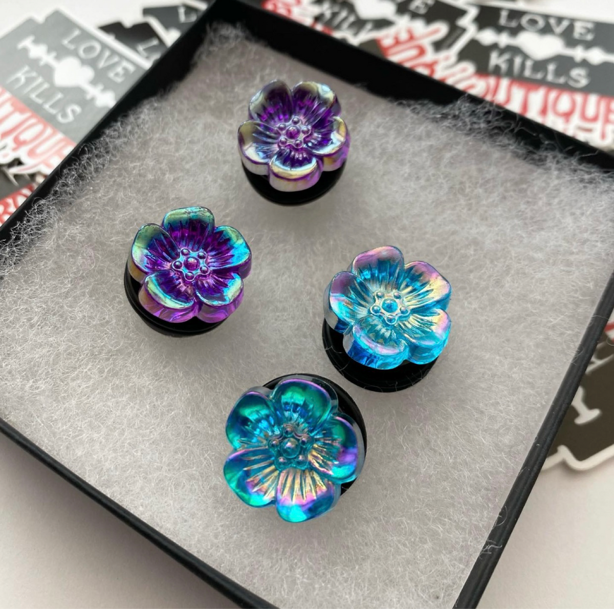  Hibiscus flower plugs for stretched lobes with an iridescent background