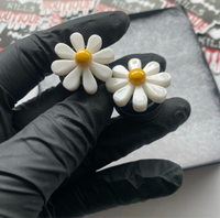 Flower power Daisy plugs for stretched lobes