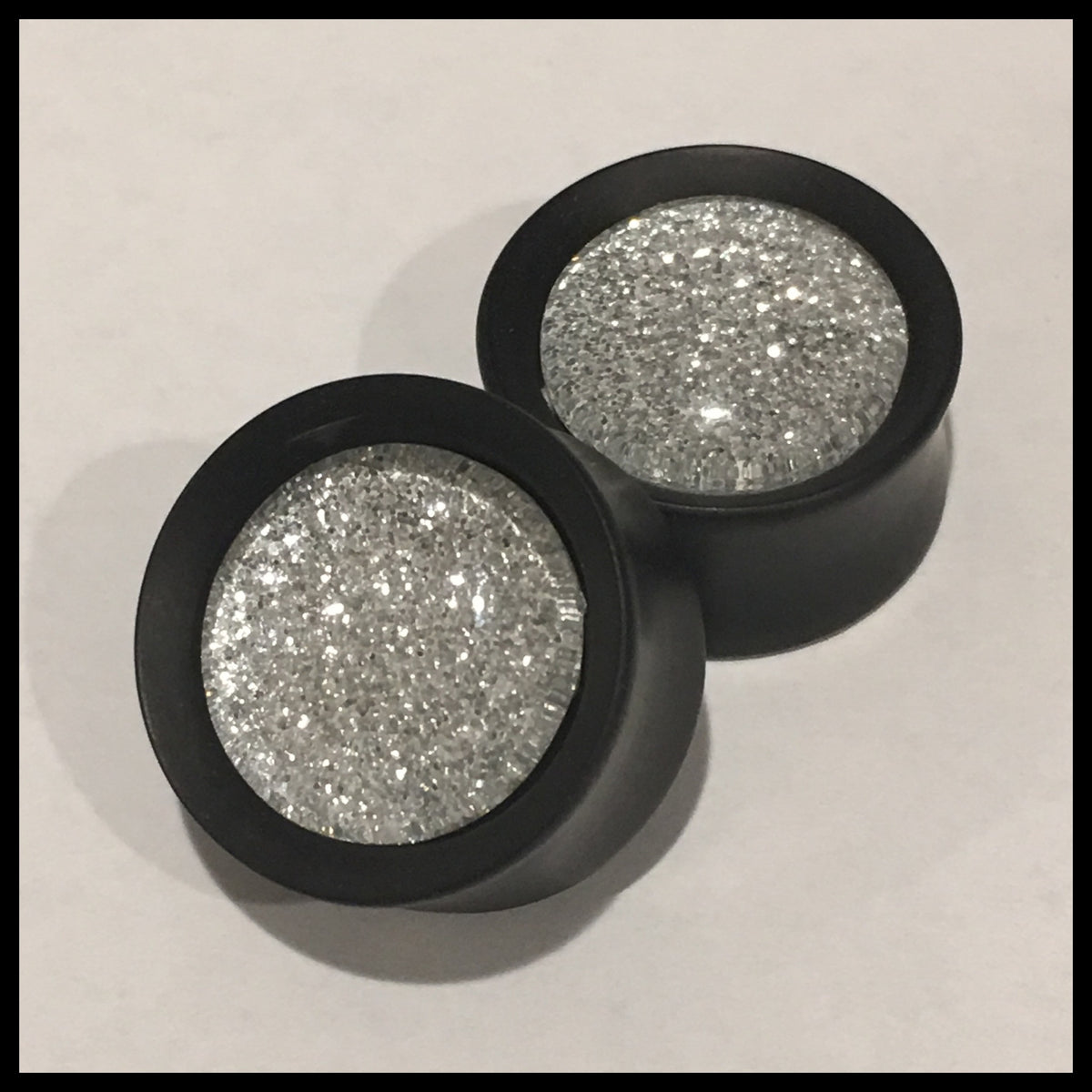 Ebony Silver Sparkle Round Plugs