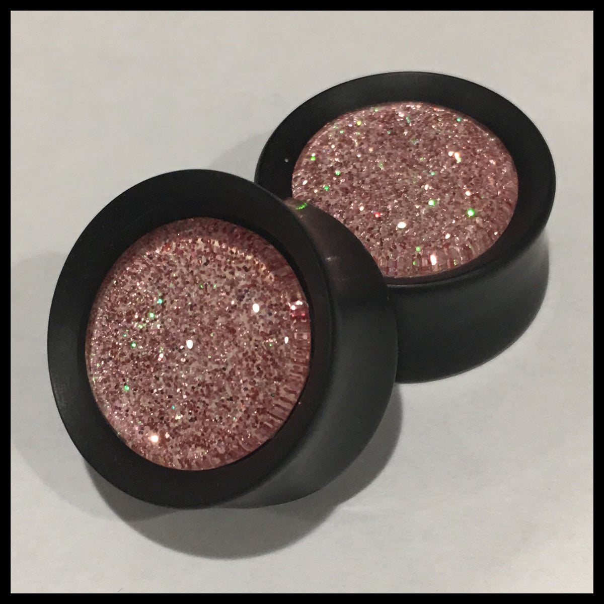 Ebony Soft Pink Sparkle Round Plugs