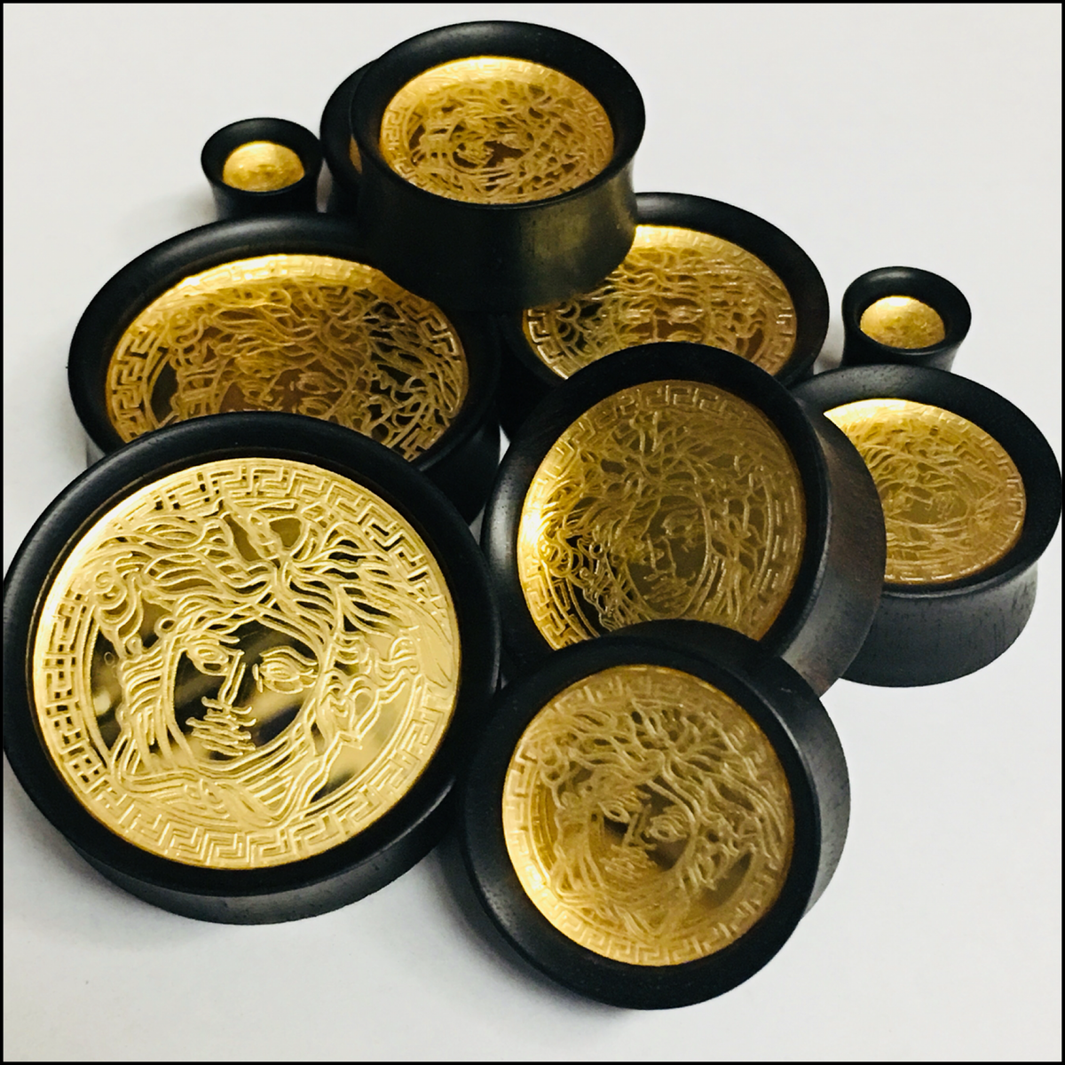 Ebony Gold Mirror Medusa Round Plugs